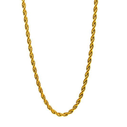 A gold rope chain necklace laid out on a plain background.
