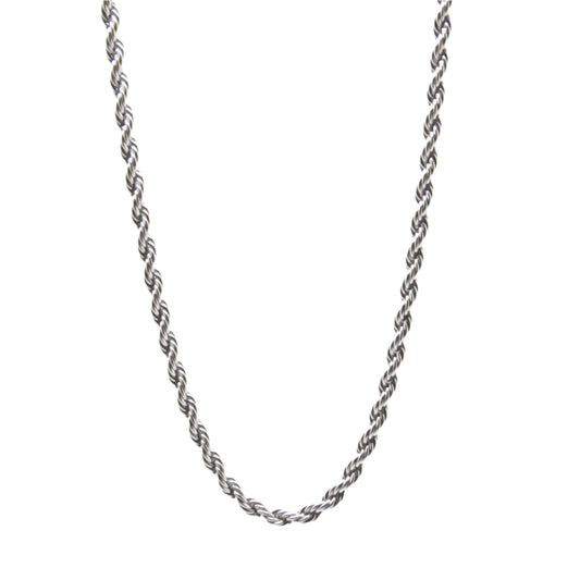 Silver rope chain necklace on white background