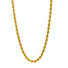 A gold rope chain necklace laid out on a plain background.