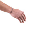 a man hand with silver box bracelet 