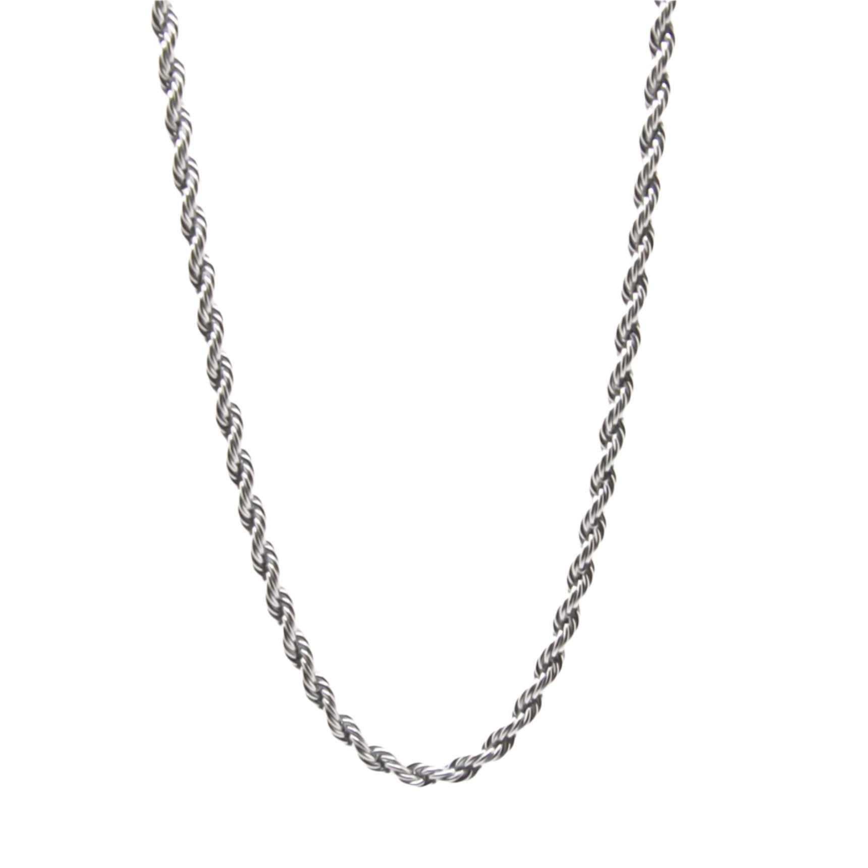 Silver rope chain necklace on white background